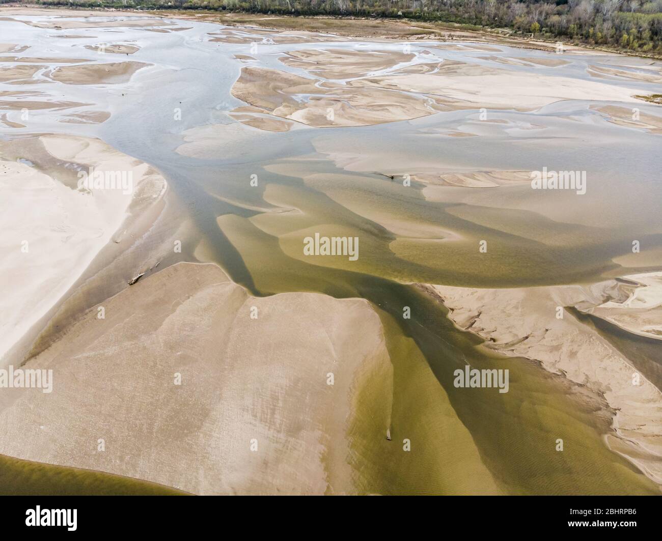 Low water level in Vistula river near Warsaw, capital of Poland. Europe is drying up, level of water in rivers and lakes is alarming Stock Photo