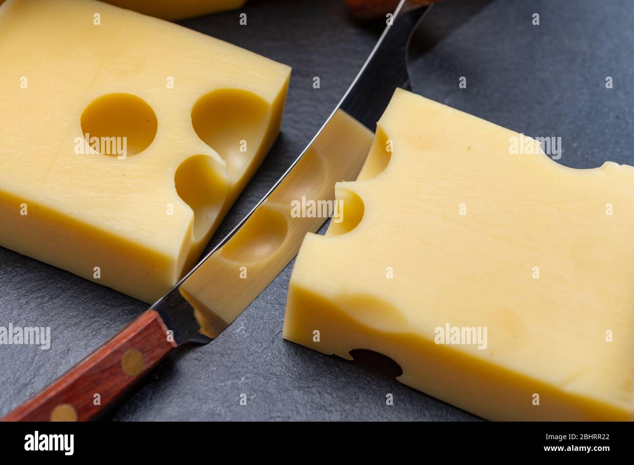 Block Of Swiss Medium Hard Yellow Cheese Emmental Or Emmentaler With Round Holes And Cheese Knife Close Up Stock Photo Alamy,Painting Baseboards