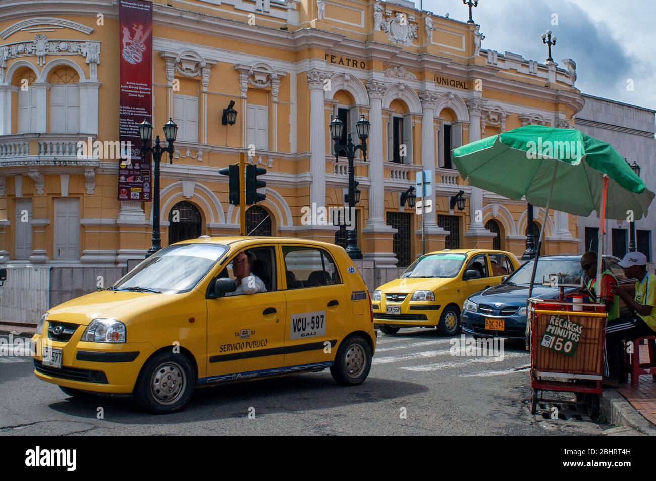 Taxis in front of Teatro Municipal Theater in Cali, Departamento Valle del Cauca, Colombia, Latin America, South America Stock Photo