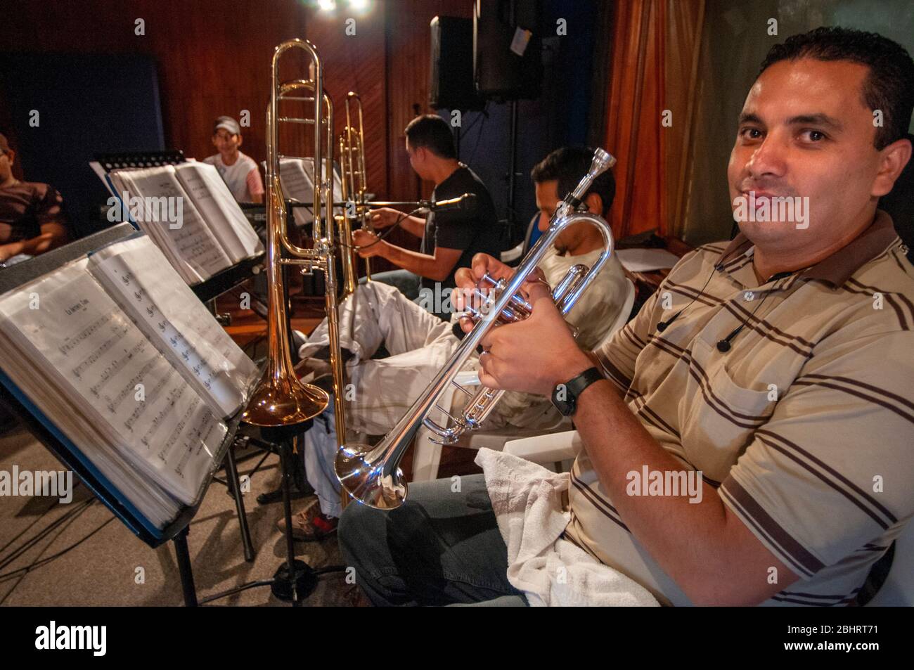 Practice in a Cali studio of the Guayacán orchestra a Colombian salsa orchestra. Cali the Cauca Valley, Colombia, South America.  It is musically dire Stock Photo