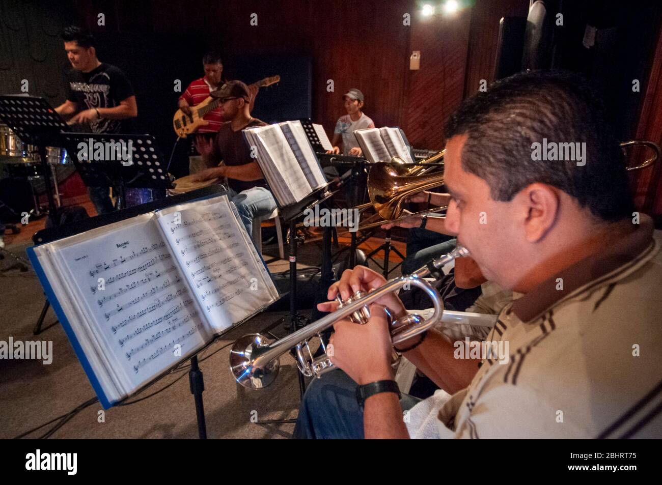 Practice in a Cali studio of the Guayacán orchestra a Colombian salsa orchestra. Cali the Cauca Valley, Colombia, South America.  It is musically dire Stock Photo