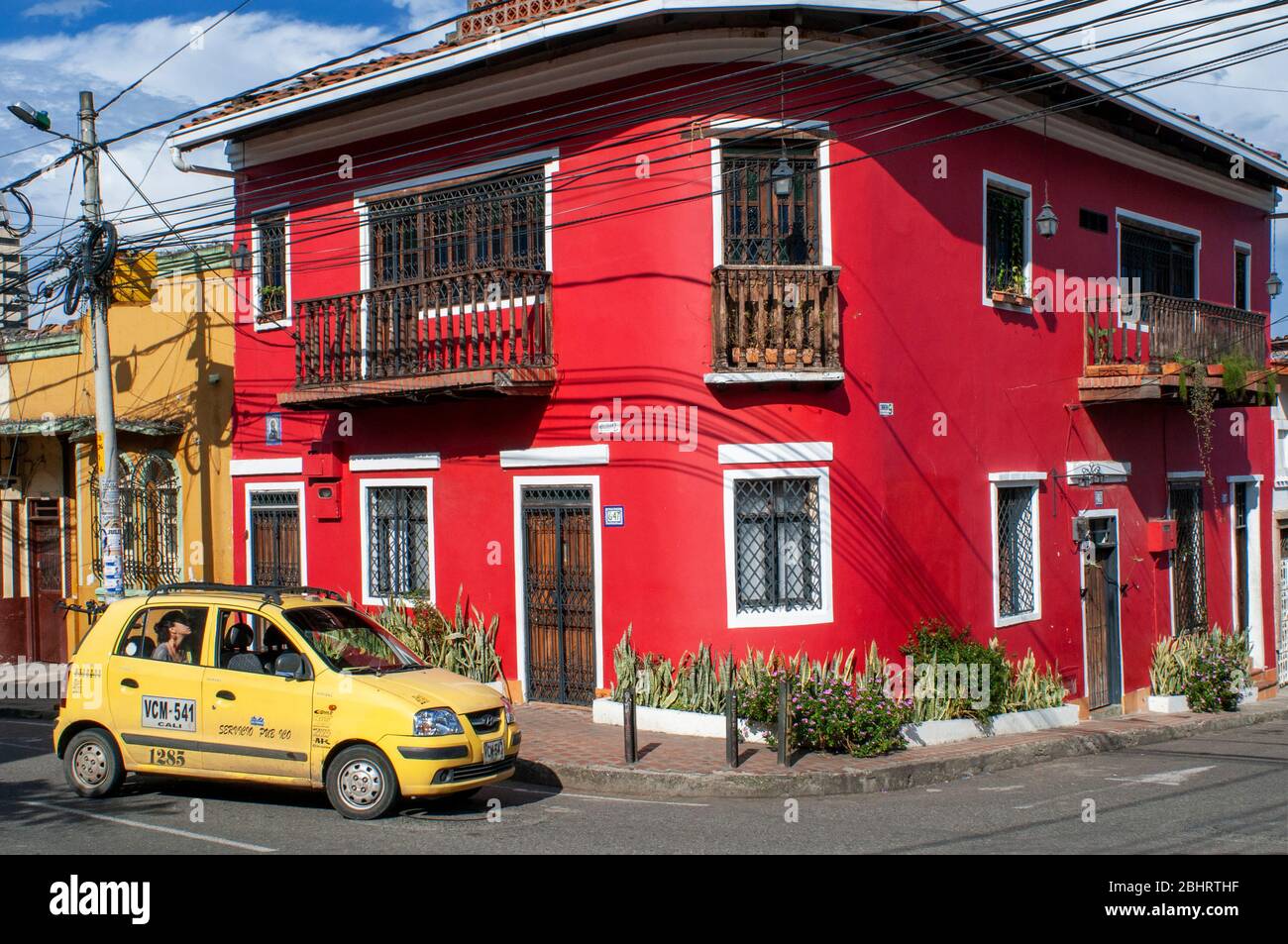 Red colorful houses in the streets of San Antonio of Cali in the Cauca Valley, Colombia, South
