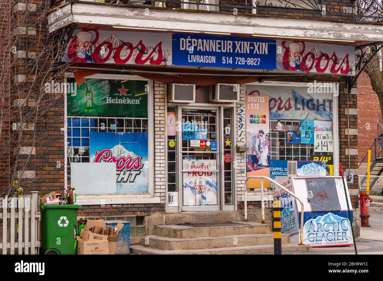 Montreal, CA - 27 April 2020: Facade of a traditional Depanneur convenience store on Dandurant street. Stock Photo