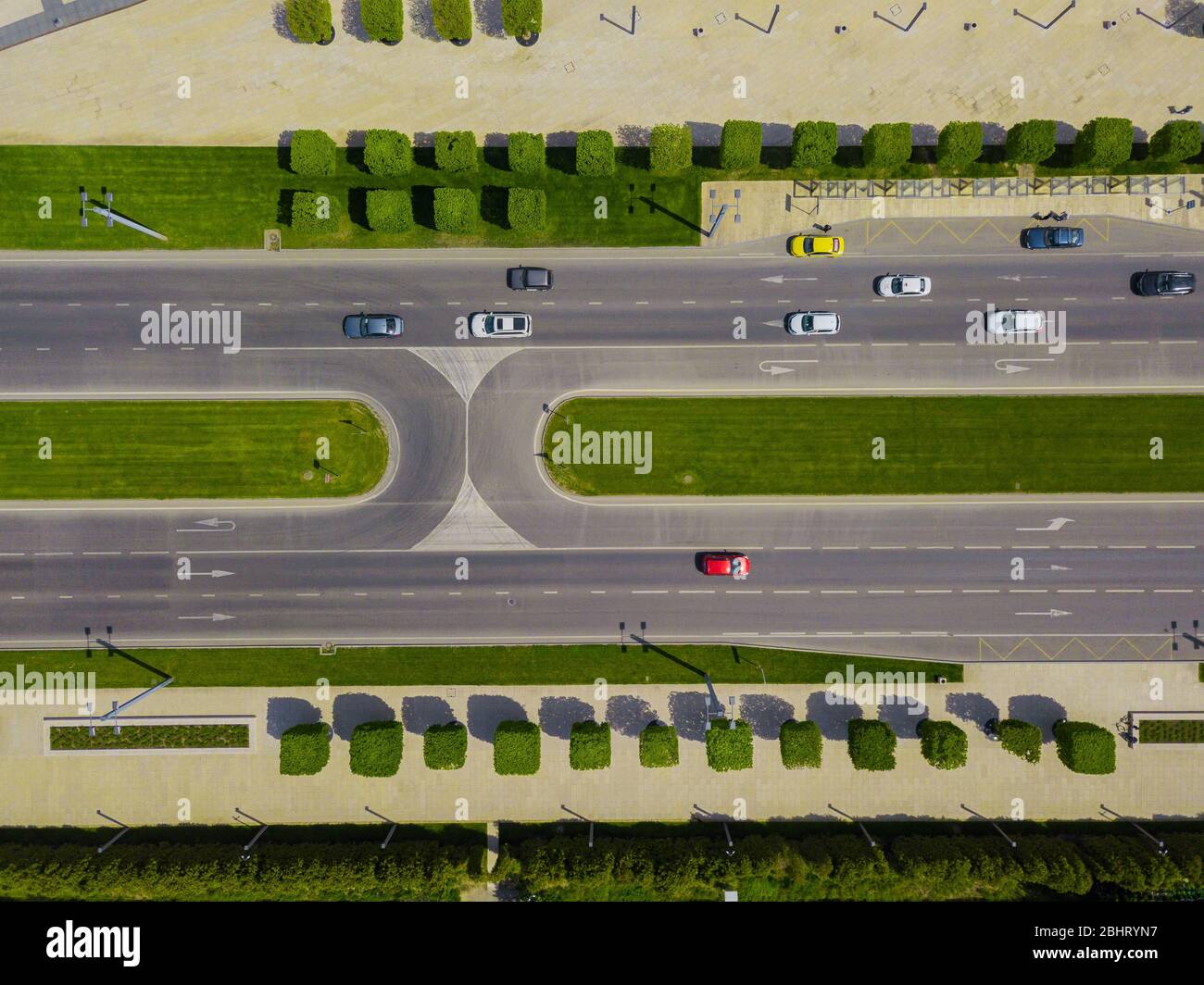 Aerial view of the vehicular intersection, city traffic with cars on ...