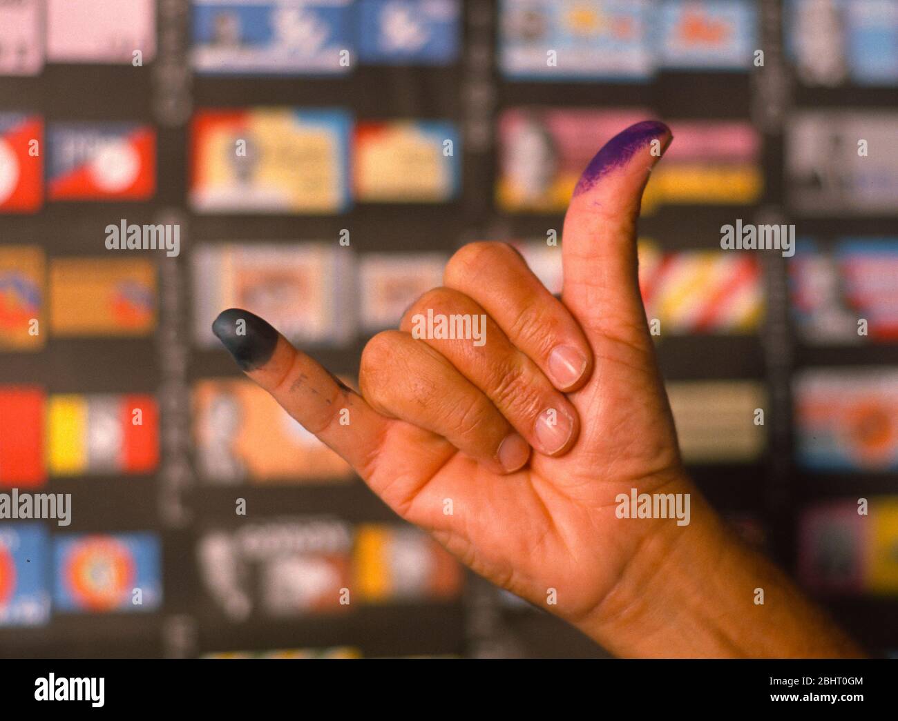 CARACAS, VENEZUELA, DECEMBER 4, 1988: Permanent ink-stained  finger and thumb to prove voting in presidential election. Stock Photo