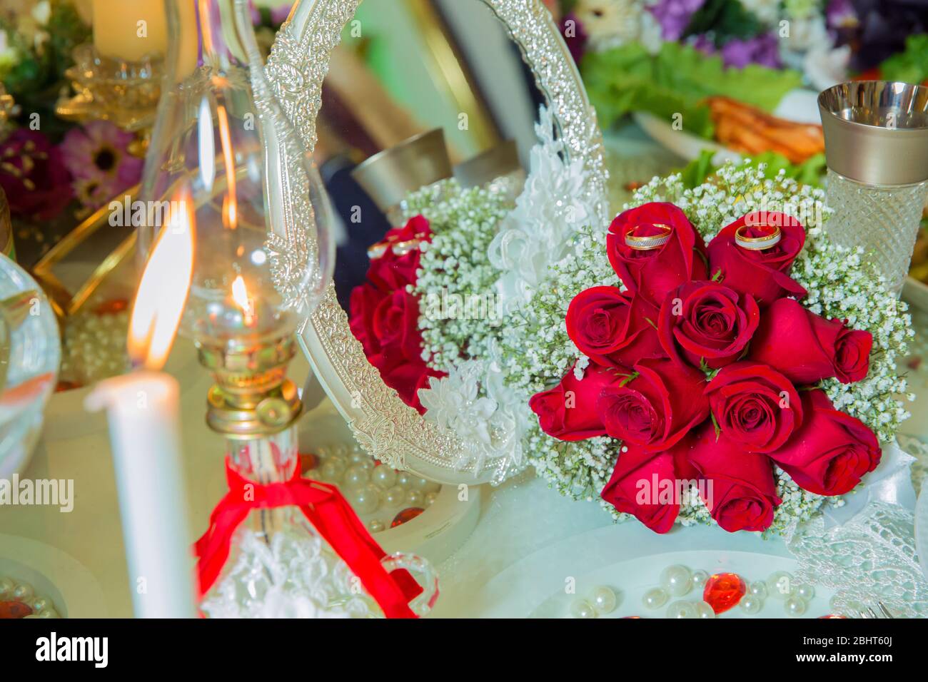Red Ribbon Red Engagement Flowers On White Table Bride And Groom With Engagement Gold Rings Put On The Red Wedding Bouquet Red Engagement Stock Photo Alamy