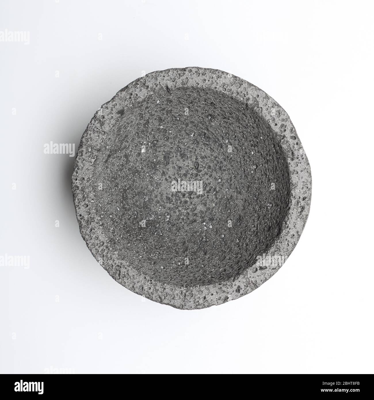 Traditional Mexican mortar and pestle. Molcajete made from volcanic