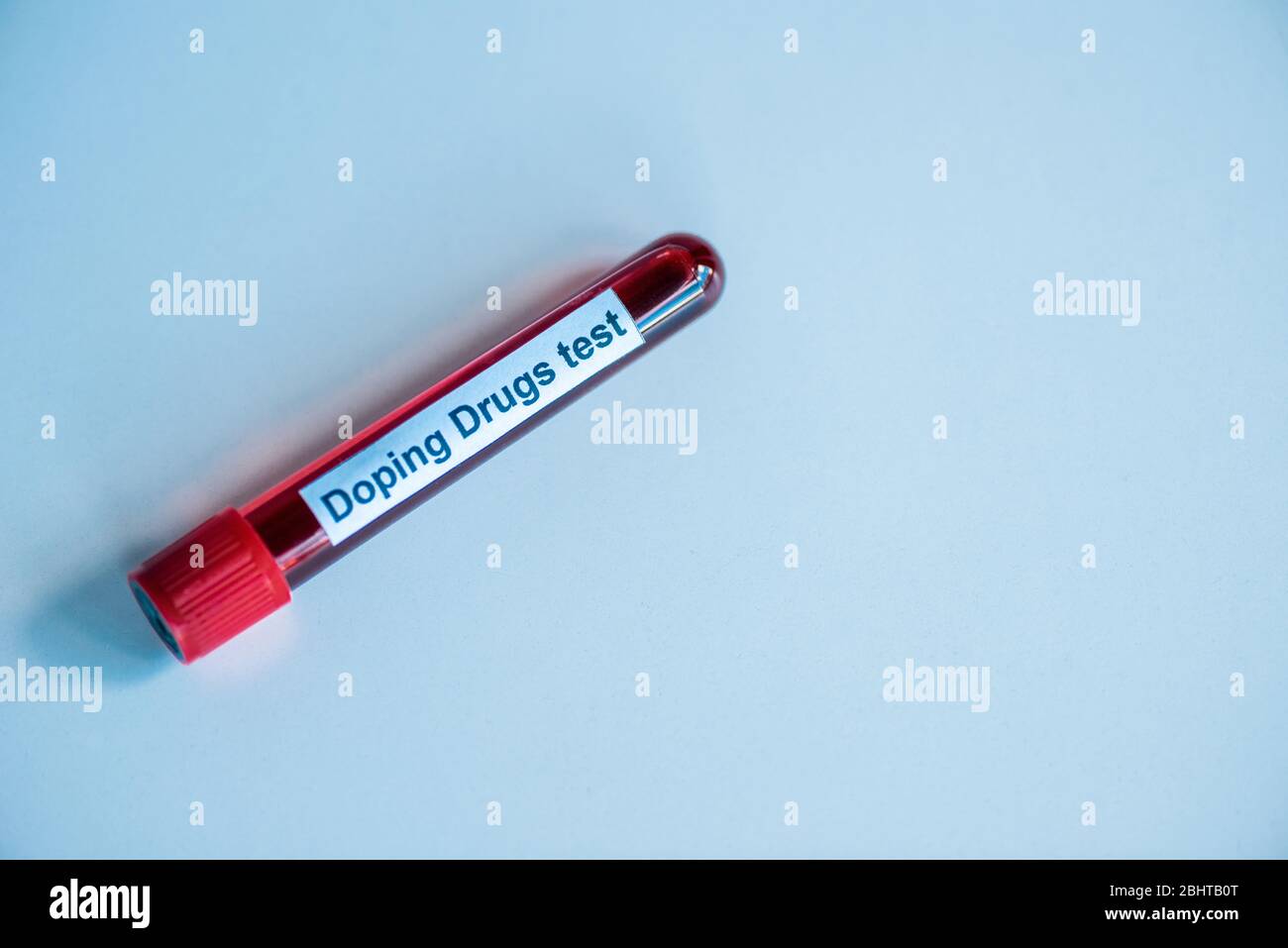 top view of test tube with blood sample and doping drugs test lettering