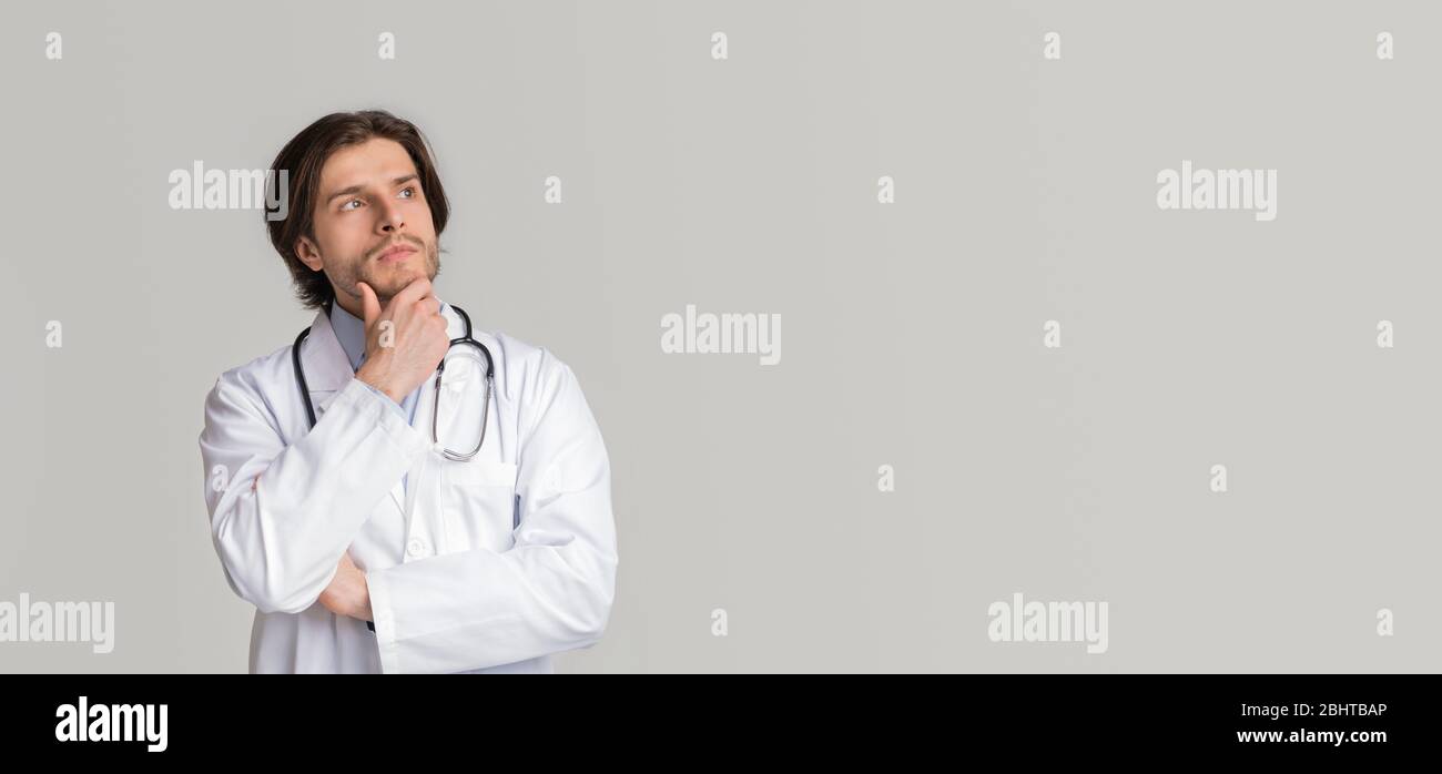 Pensive ethnic male doctor hi-res stock photography and images - Alamy