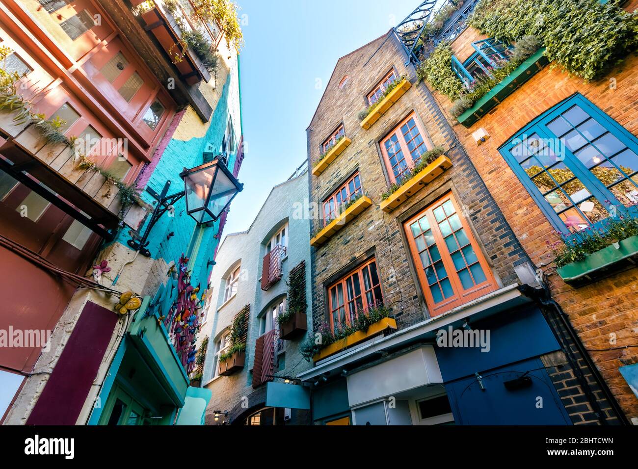 Wide Angle View of Traditional Colourful Houses under Morning Blue Skies in Covent Garden, London, UK Stock Photo