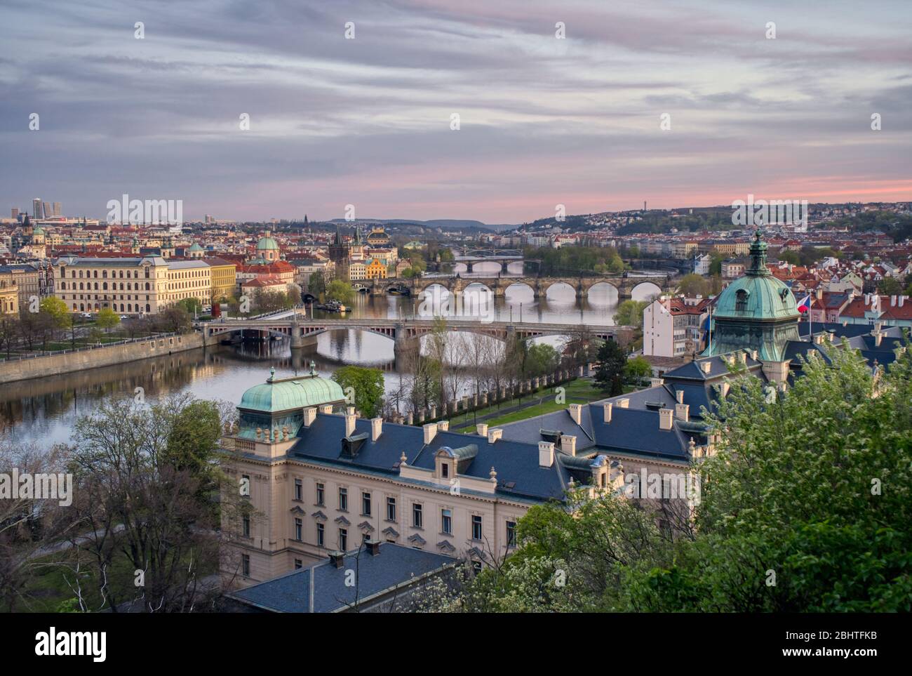 Prague river with bridges preparing for the night after beautiful ...
