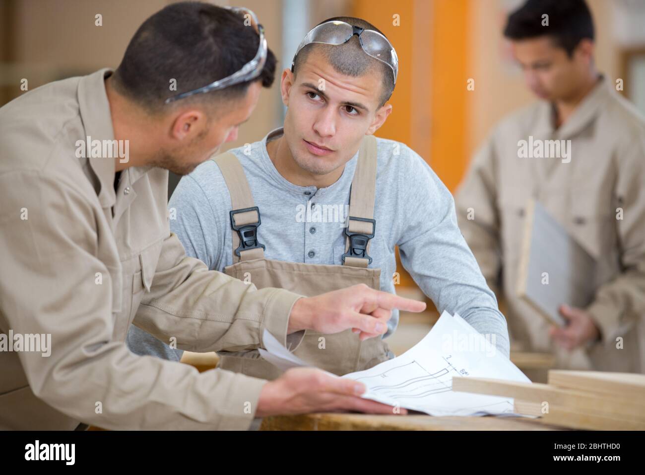 Carpenter working trainee in workshop hi-res stock photography and ...