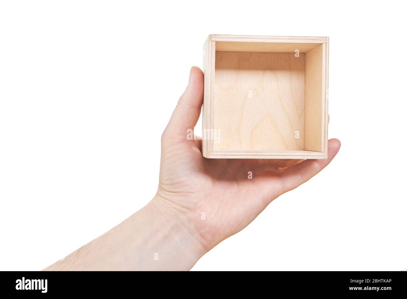Hand hold Empty wood Box isolated on white background Stock Photo