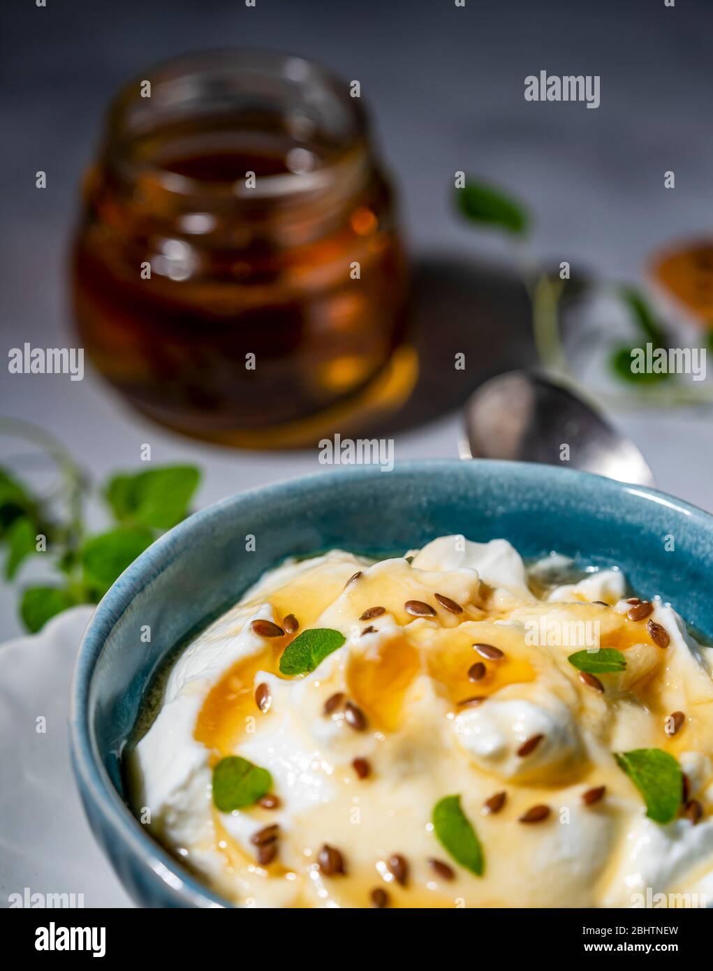 Greek yogurt with flax seeds and honey Stock Photo Alamy