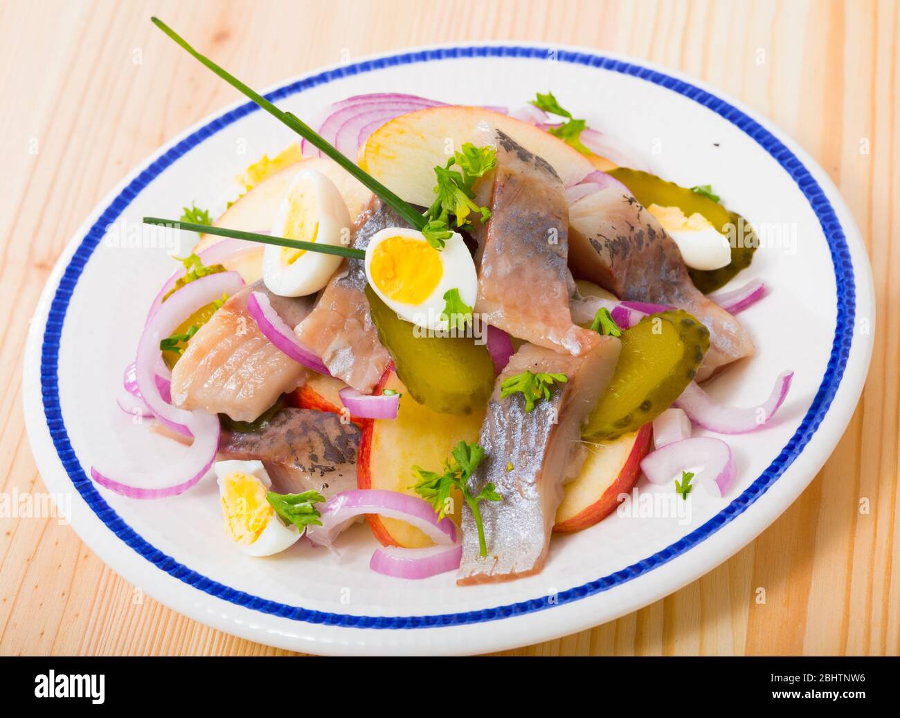 Norwegian cuisine, herring salad with apples and pickled cucumbers