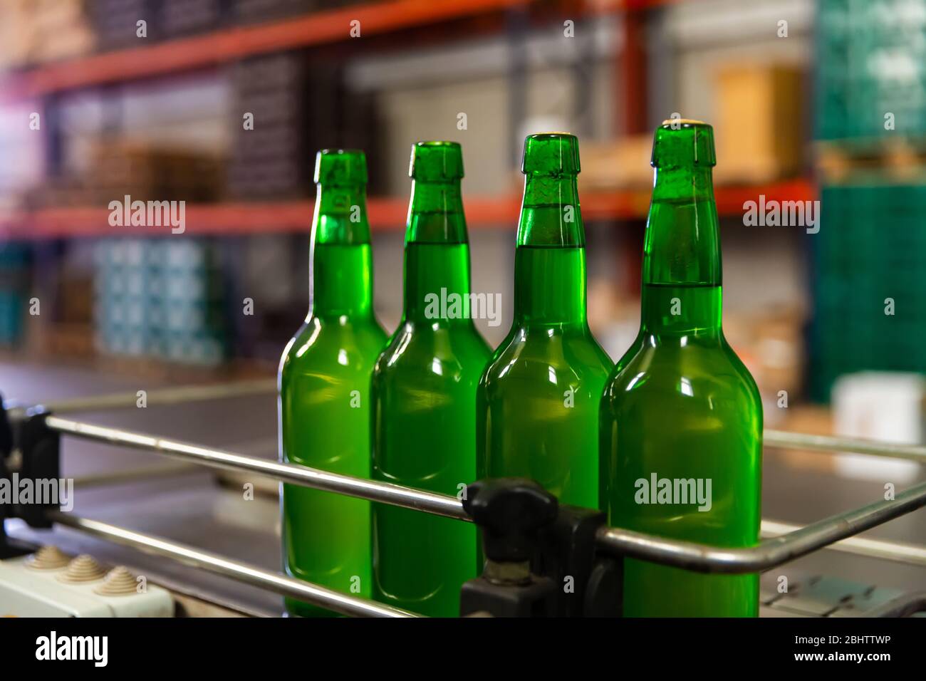 Bottling and sealing conveyor line in Asturian Sidreria traditional