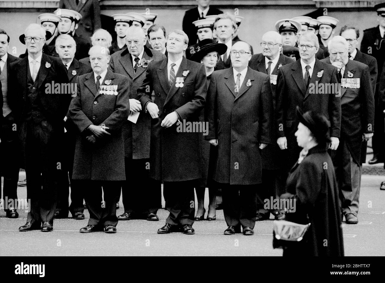 The Queen at the Cenotaph in London on Remembrance Sunday, watched by politicians including John Major, Margaret Thatcher, James Callaghan, Ian Paisley, Edward Heath, Norman Lamont, John Smith, Paddy Ashdown and Douglas Hurd. Stock Photo