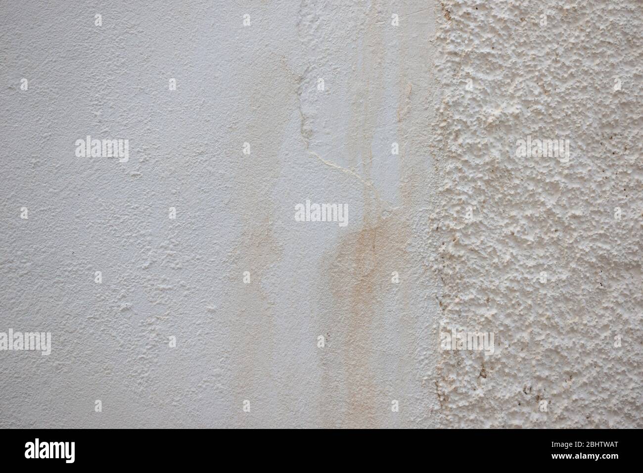 Old grunge beige plastered wall texture background Stock Photo