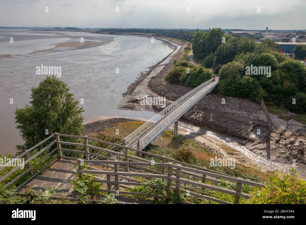Ditton Brook rises in south Liverpool and meets the Mersey Estuary where the Trans Pennine Trail enters Pickerings Pasture Local Nature Reserve Stock Photo