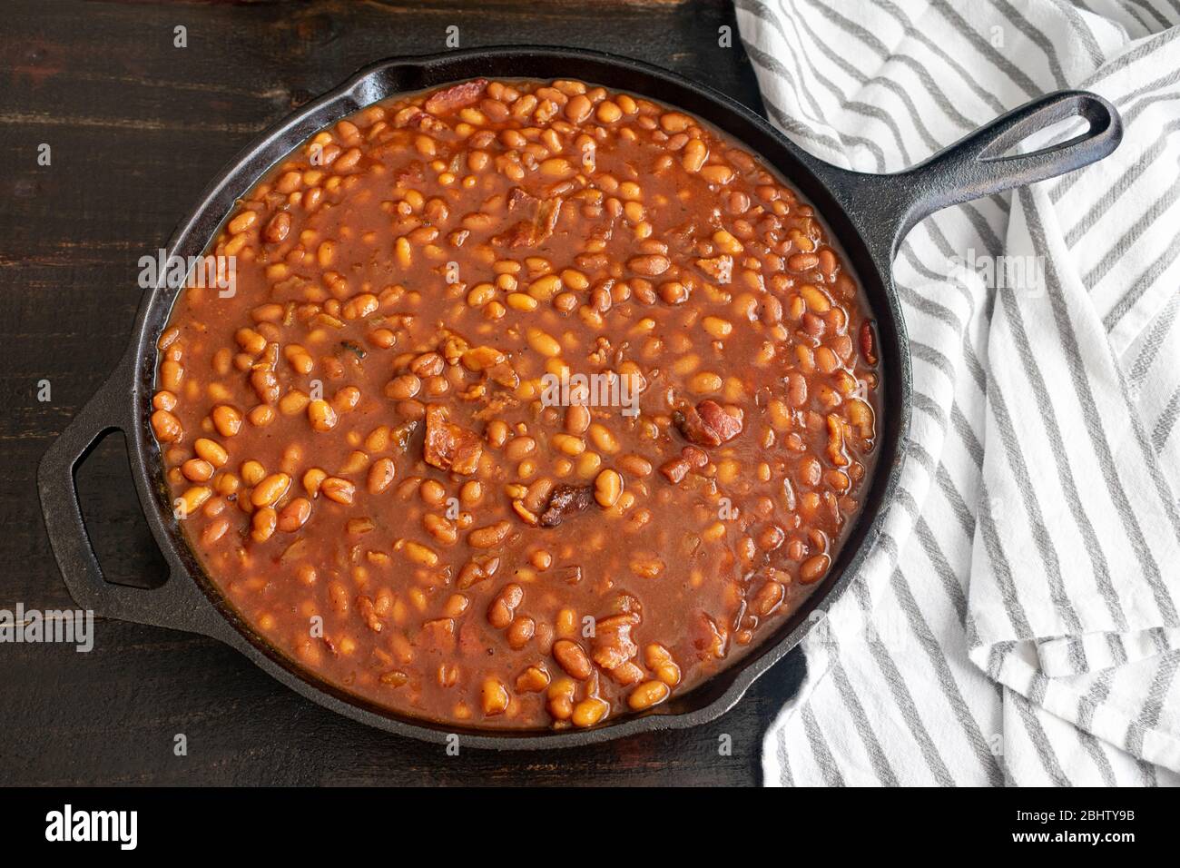 Bourbon Baked Beans in a Cast Iron Skillet Pork and beans seasoned