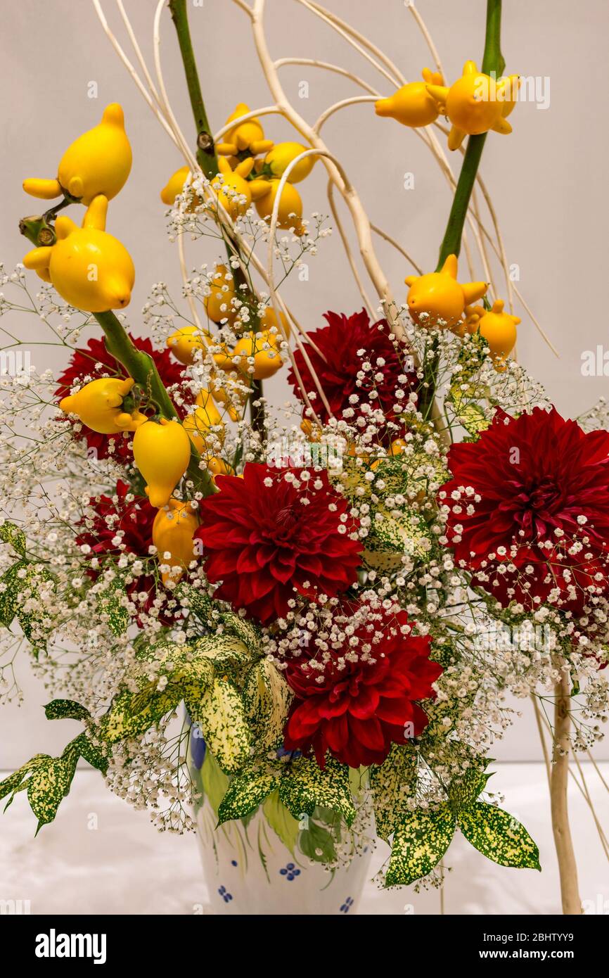Beautiful Ikebana Japanese art of flower arrangement on white