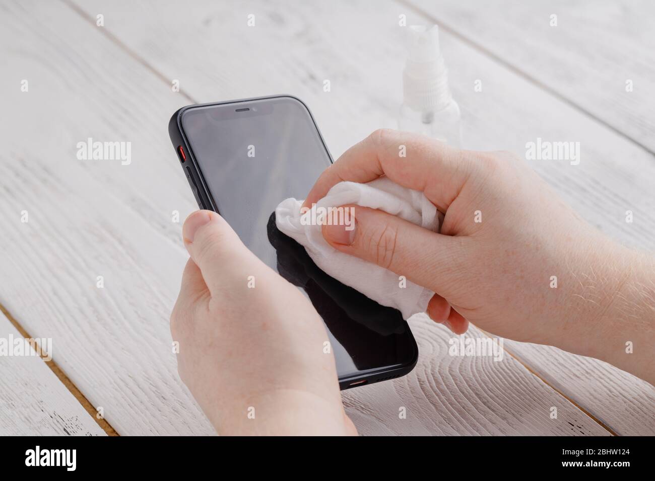 Phone screen disinfecting wipe cleaning removing germs with