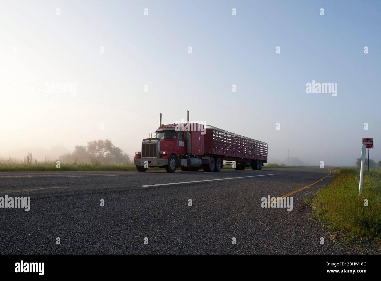 September 2010: Large truck travels along Texas Highway 77 on a foggy morning in South Texas. ©Bob Daemmrich Stock Photo