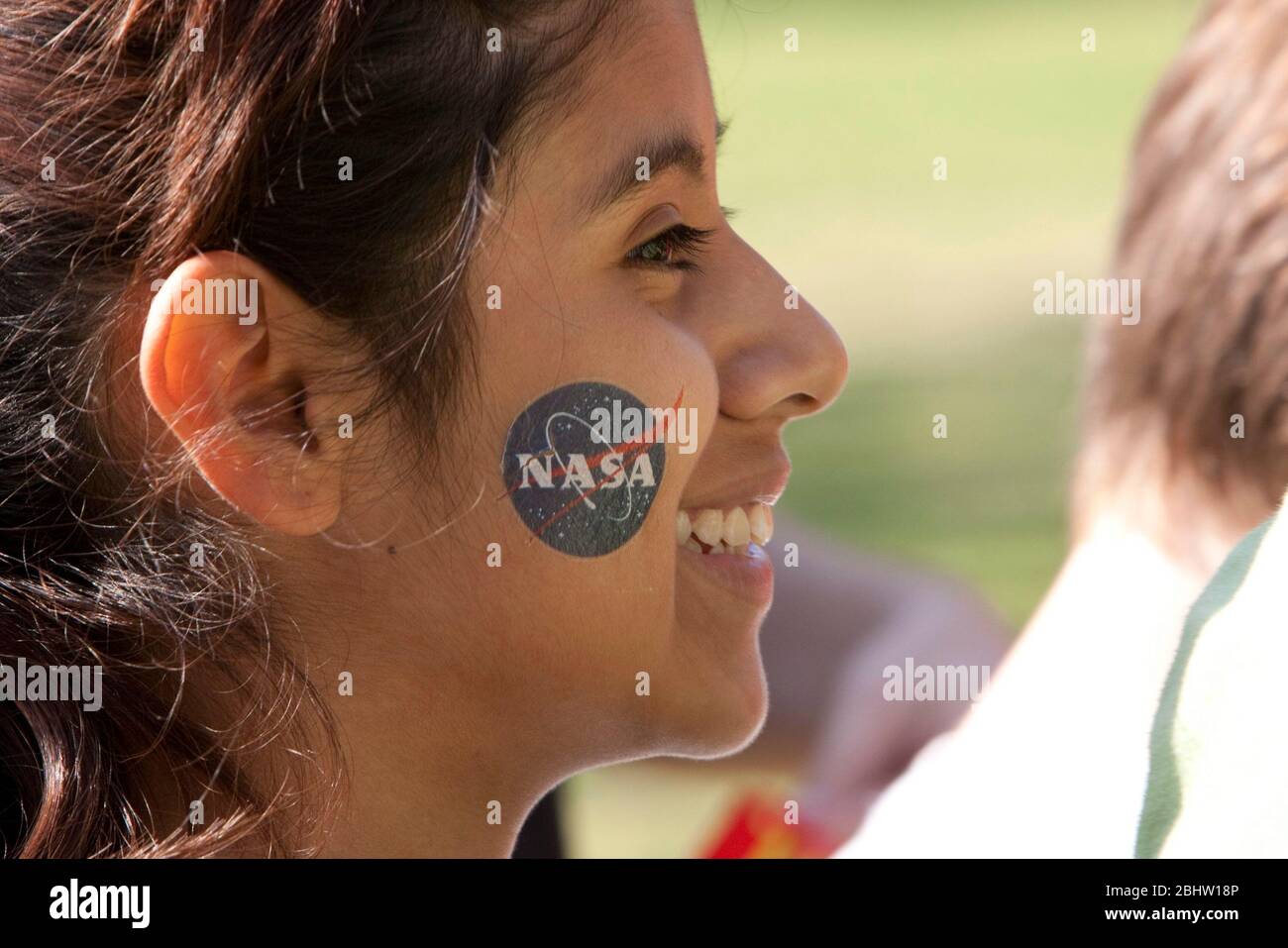 Austin, TX: Female student with a NASA decal on cheek during NASA day at the Texas Capitol  March 31, 2011. ©Marjorie Kamys Cotera / Daemmrich Photos Stock Photo