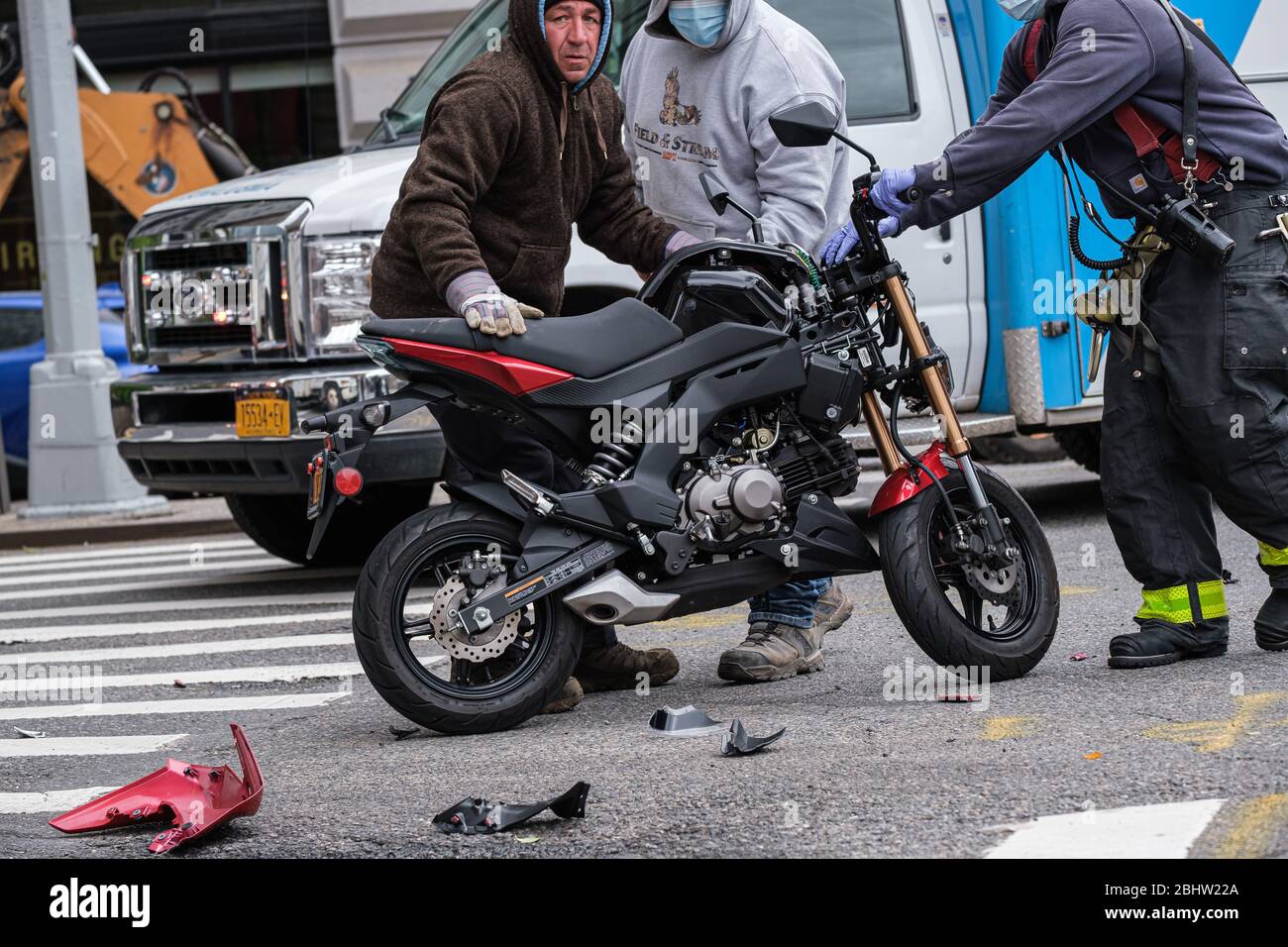 New York, USA. 27th Apr, 2020. A damaged motorcycle is moved to the