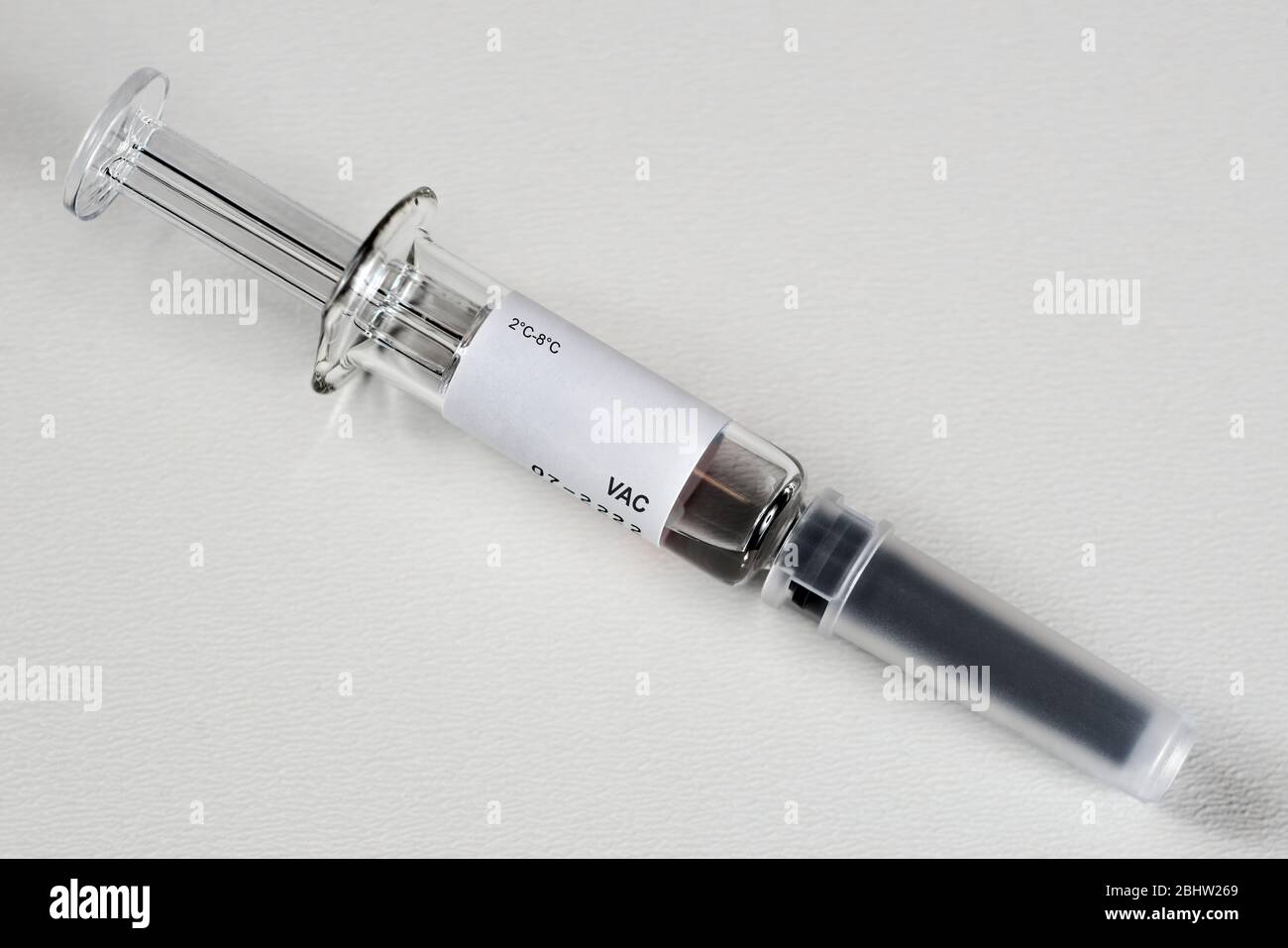 Pre-filled syringe injection with vaccine for vaccination inoculation Stock Photo