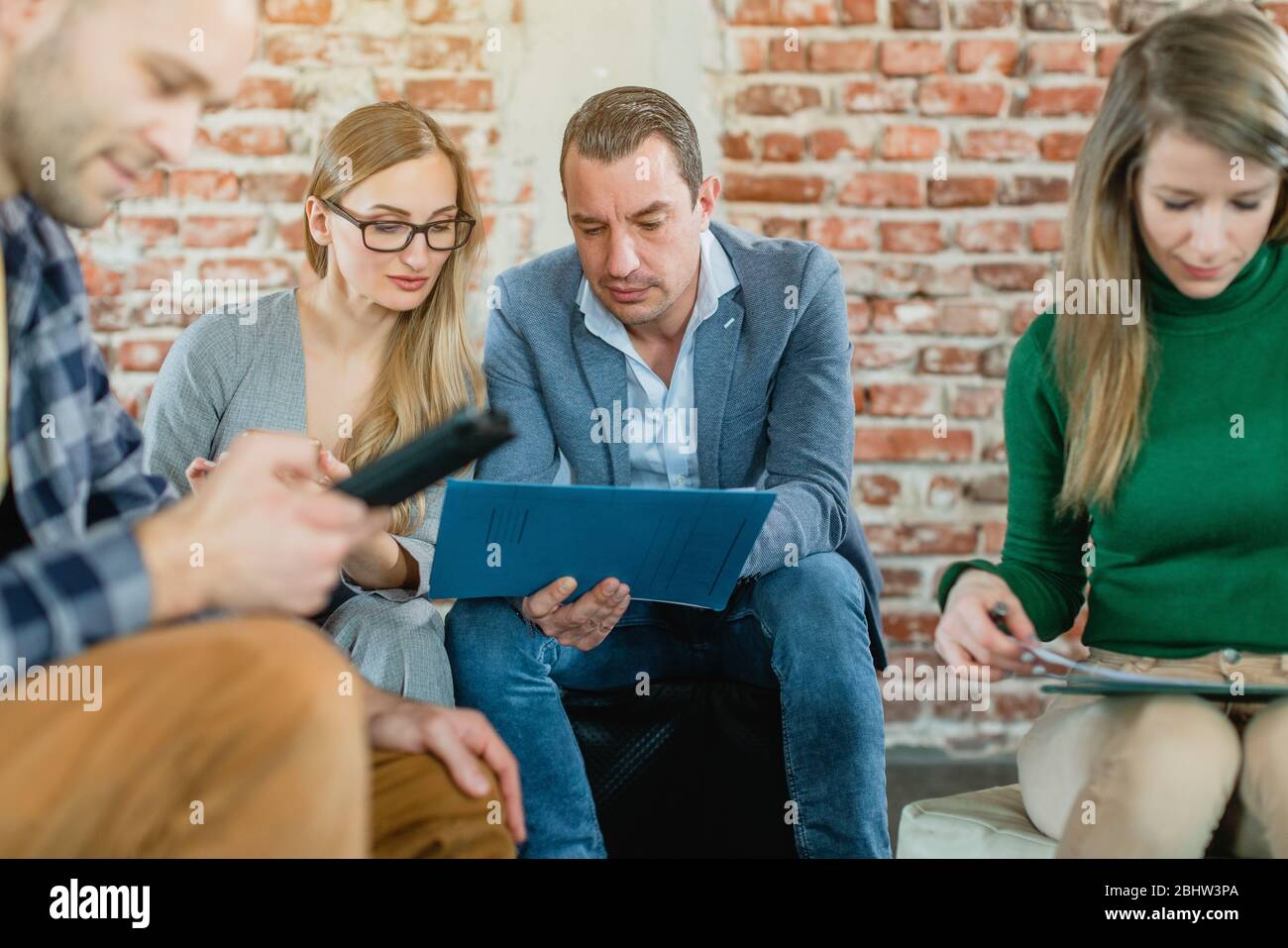 Businesspeople having an informal meeting in the office Stock Photo