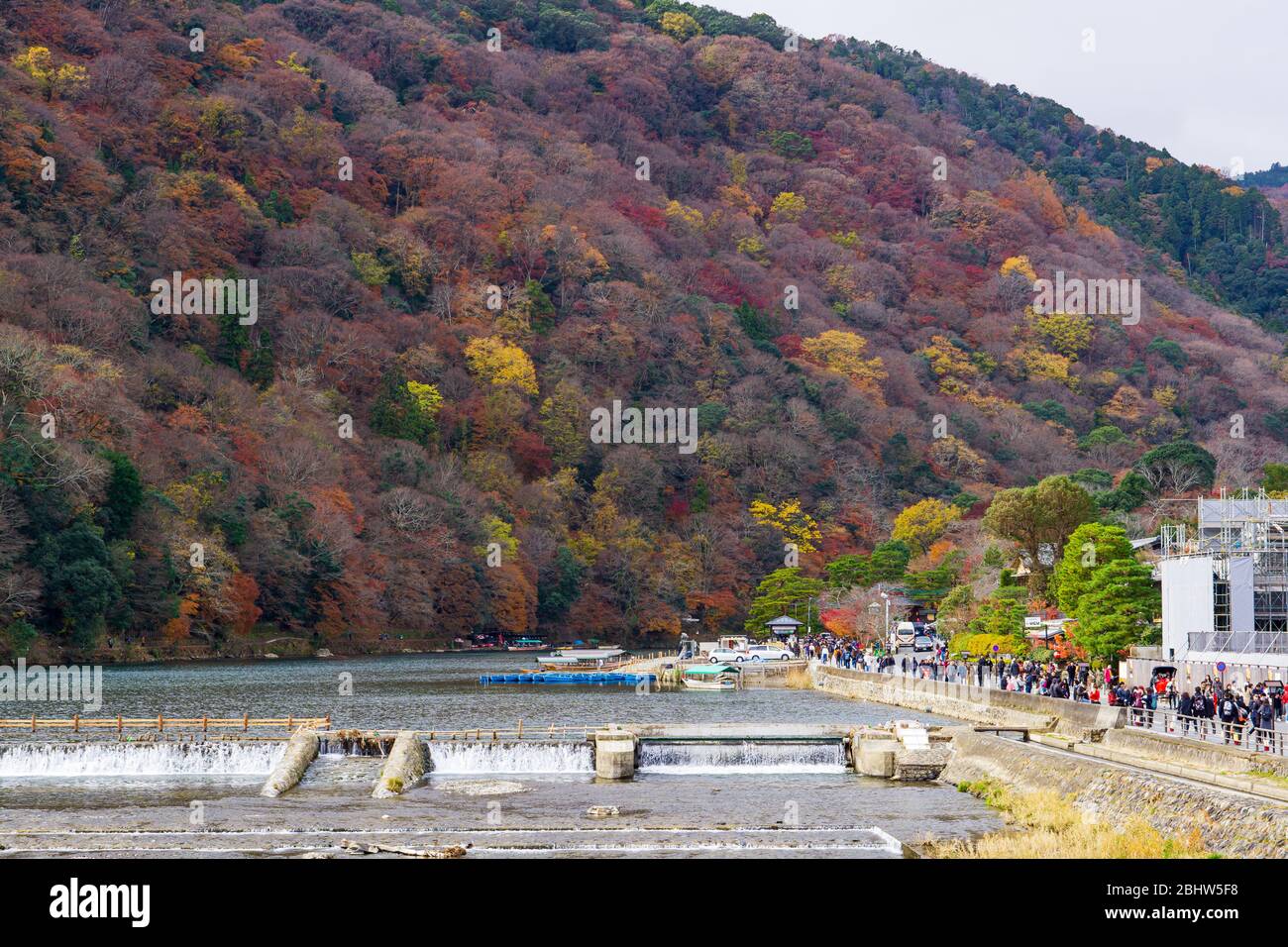 Arashiyama Togetsukyo Bridge was built during the Heian Period (794-1185), and reconstructed in the 1930s crossing the Oi River. This iconic landmark Stock Photo