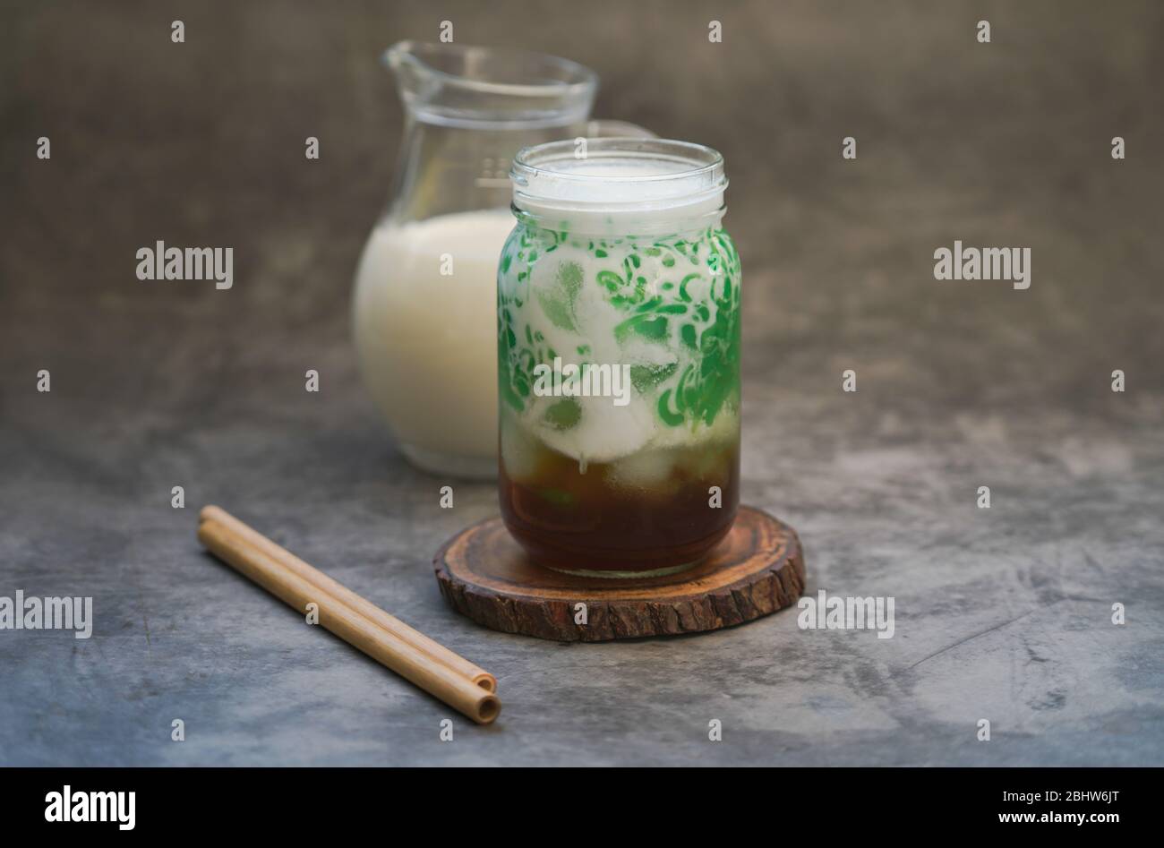 Es Cendol. Indonesian iced dessert of rice flour and pandanus jelly with coconut milk and palm sugar Stock Photo