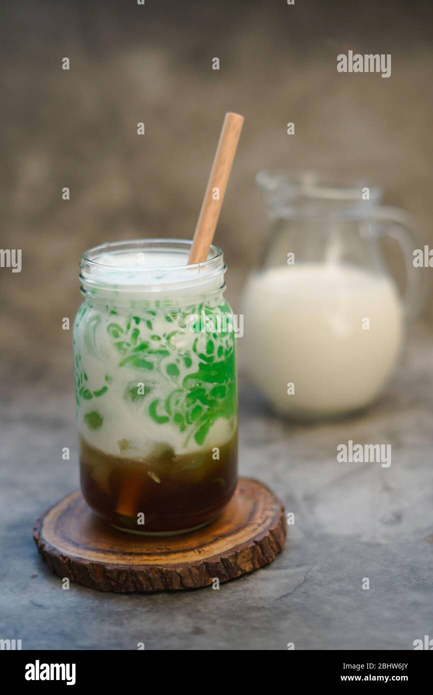 Es Cendol. Indonesian iced dessert of rice flour and pandanus jelly