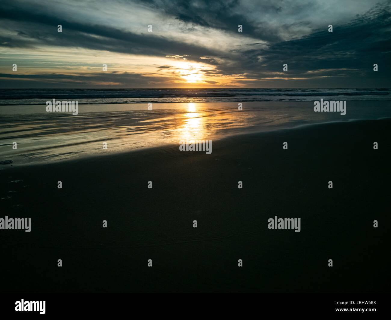 Natural reflections in the sand of the sea. Stock Photo