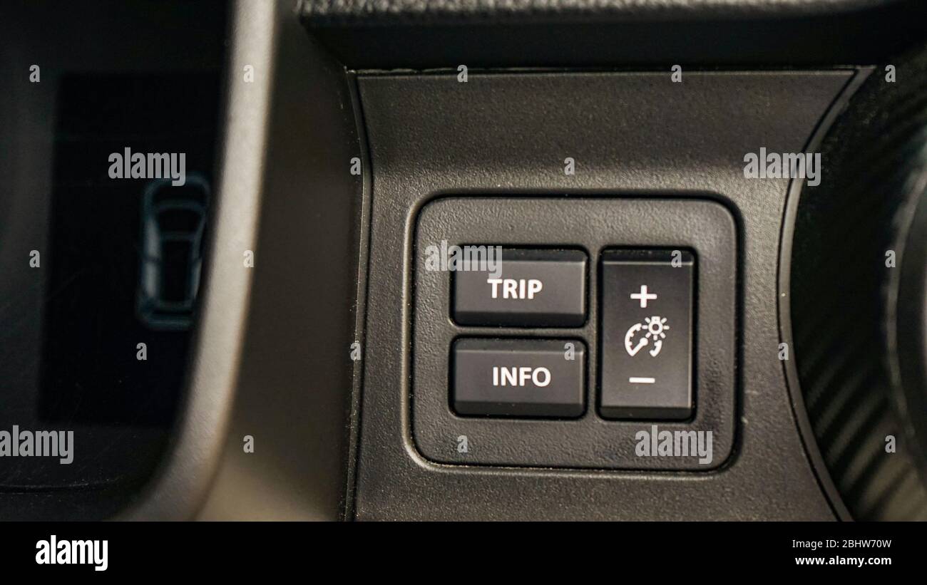Trip button and info button on the car Stock Photo Alamy