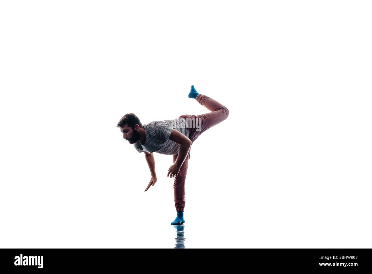 Handsome young man performing a contemporary dance routine Stock Photo Alamy
