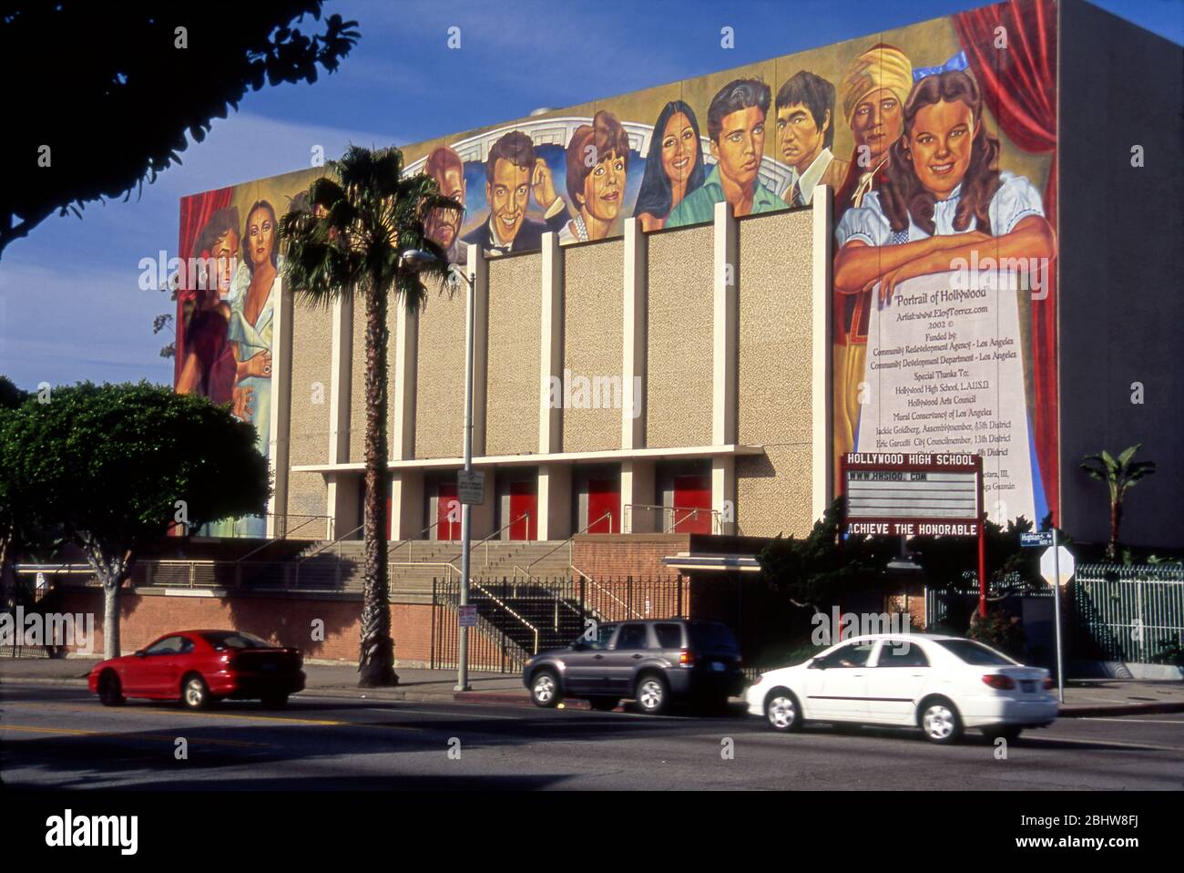 Mural titled 'Portrait of Hollywood' painted by Eloy Torrez on the auditorium exterior at Hollywood HIgh School in 2002 at Hollywod, CA Stock Photo