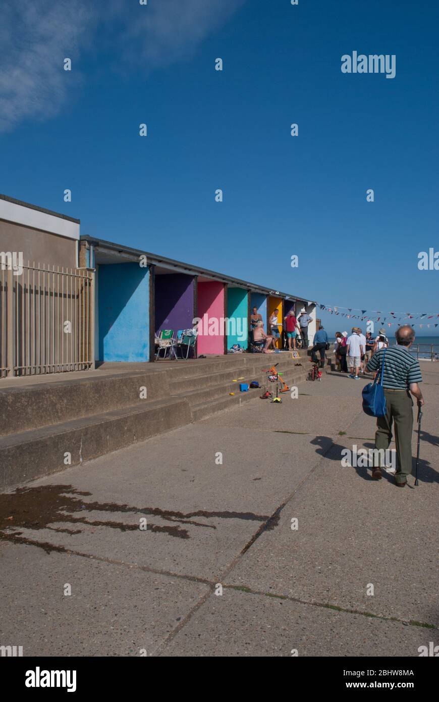 Beach huts along the sea front in Bexhill Stock Photo Alamy