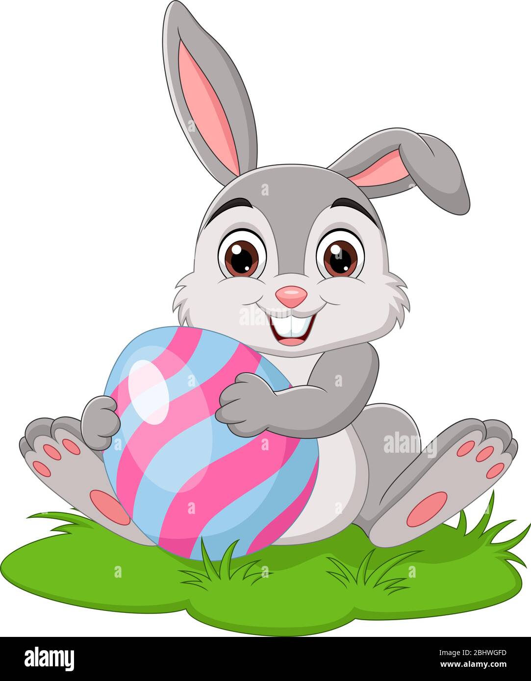 Cartoon little rabbit holding easter egg in the grass Stock Vector ...