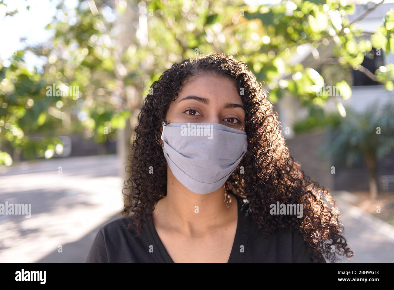 Girl in black mask hi-res stock photography and images - Alamy