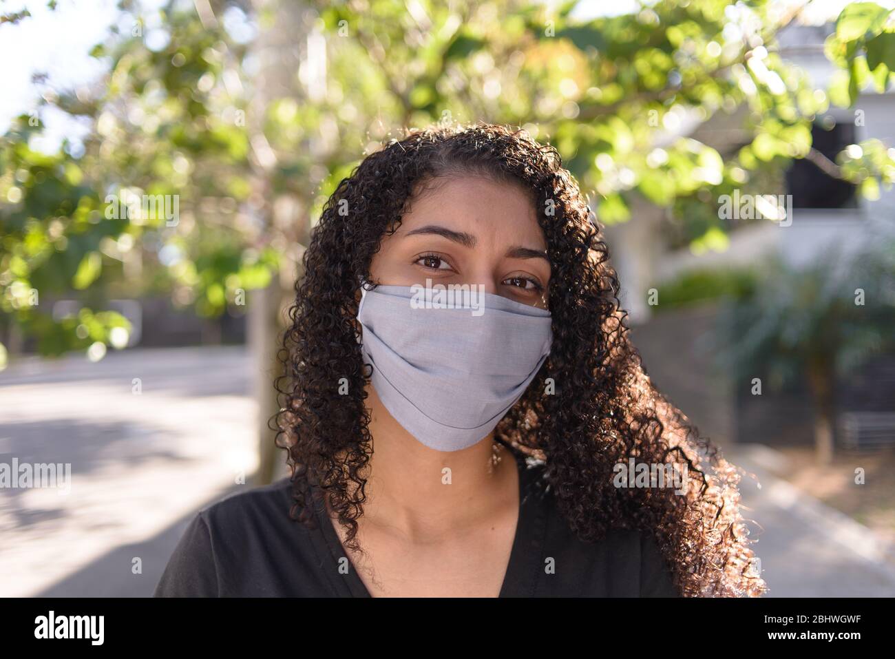 Girl in black mask hi-res stock photography and images - Alamy