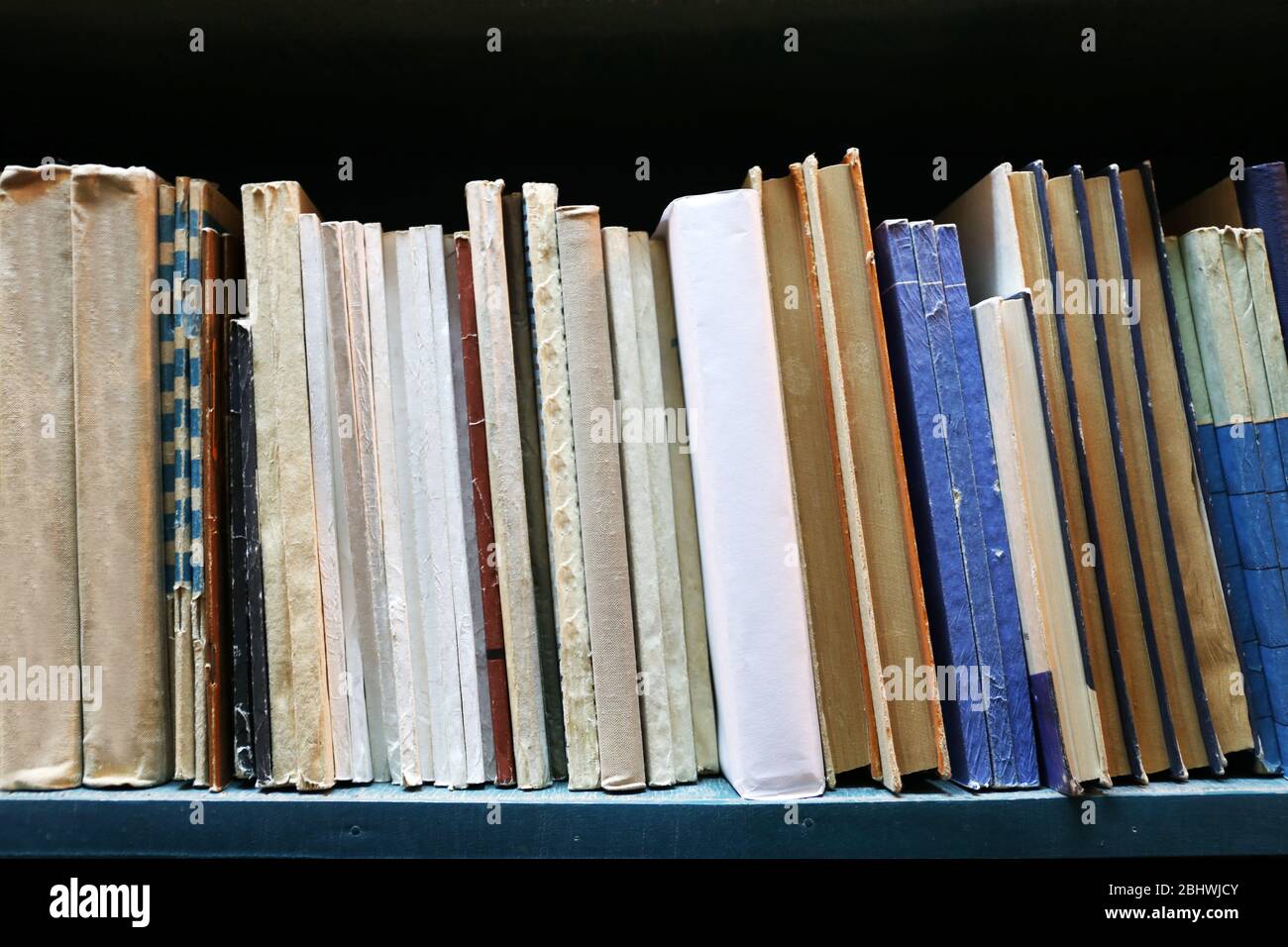 Old used books on bookshelf in library Stock Photo Alamy