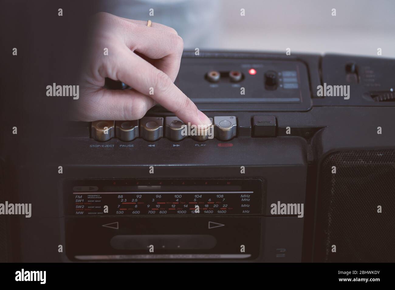 Close up hand to pick tape cassette player.Vintage style Stock Photo