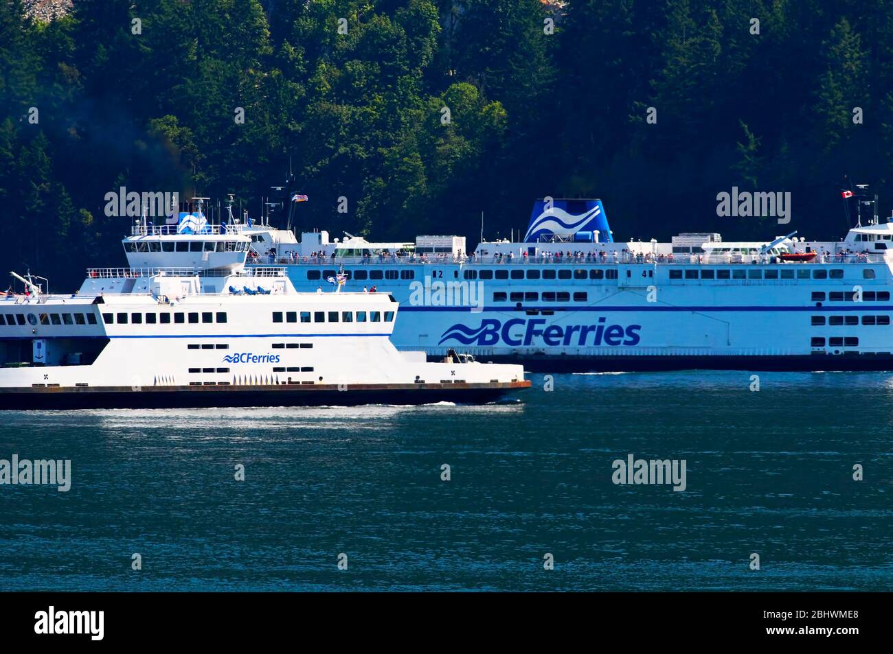 Two ferries passing each other.  Horseshoe Bay, Vancouver, B. C., Canada. Stock Photo