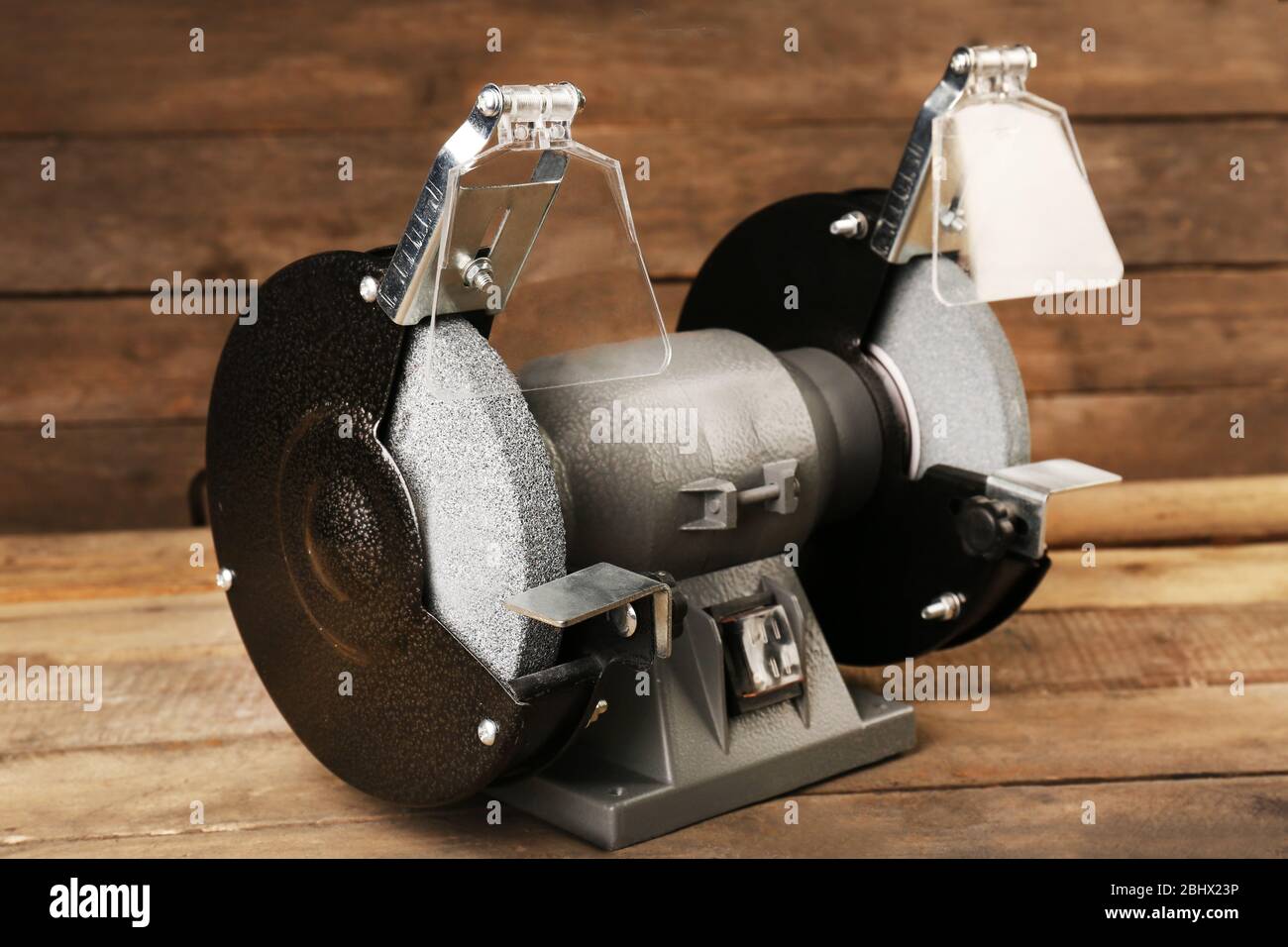 An old whetstone for sharpening knives. Grinding wheel on an old tripod.  Season of the autumn Stock Photo - Alamy