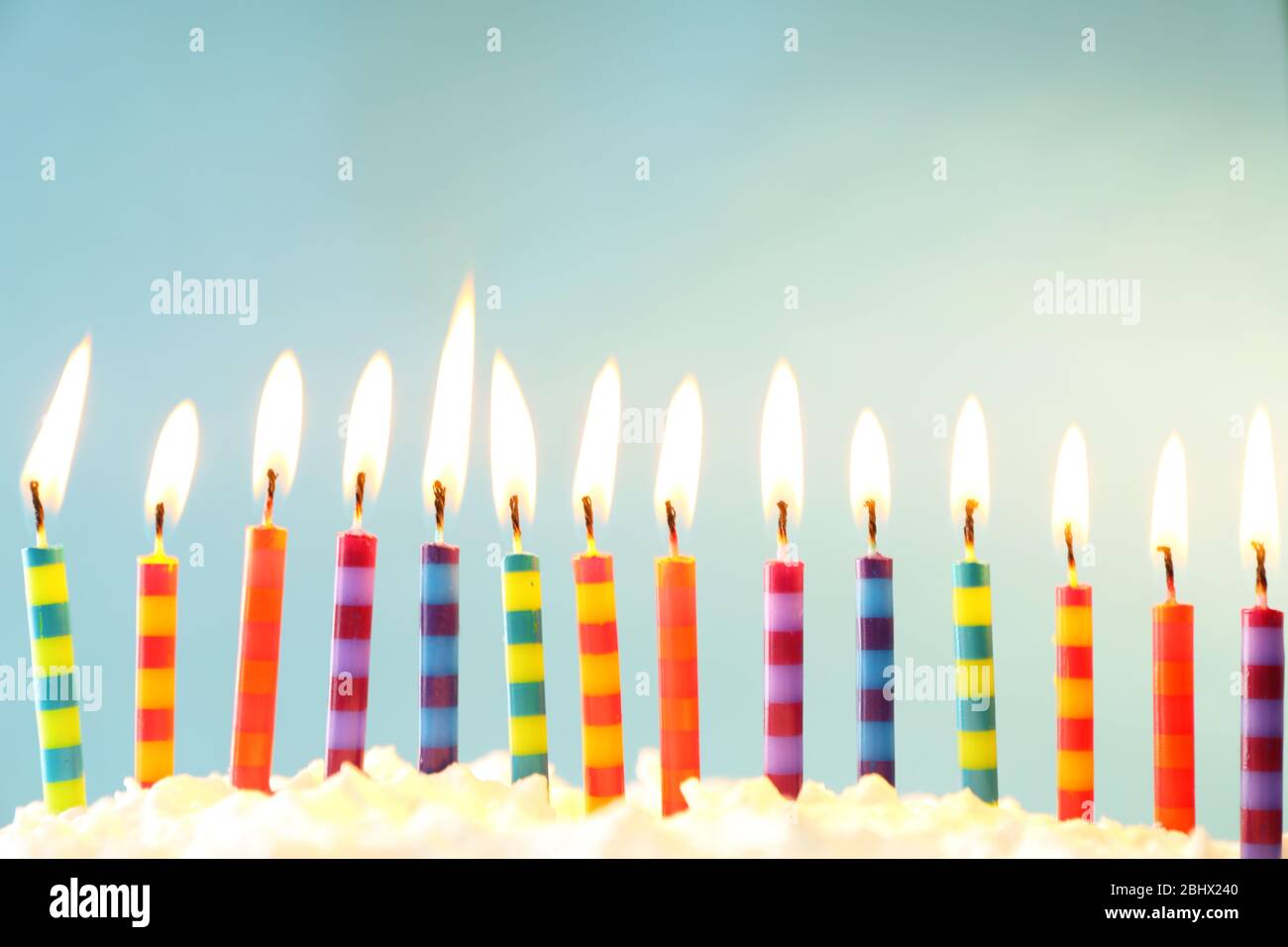 Birthday cake with candles on light background Stock Photo - Alamy