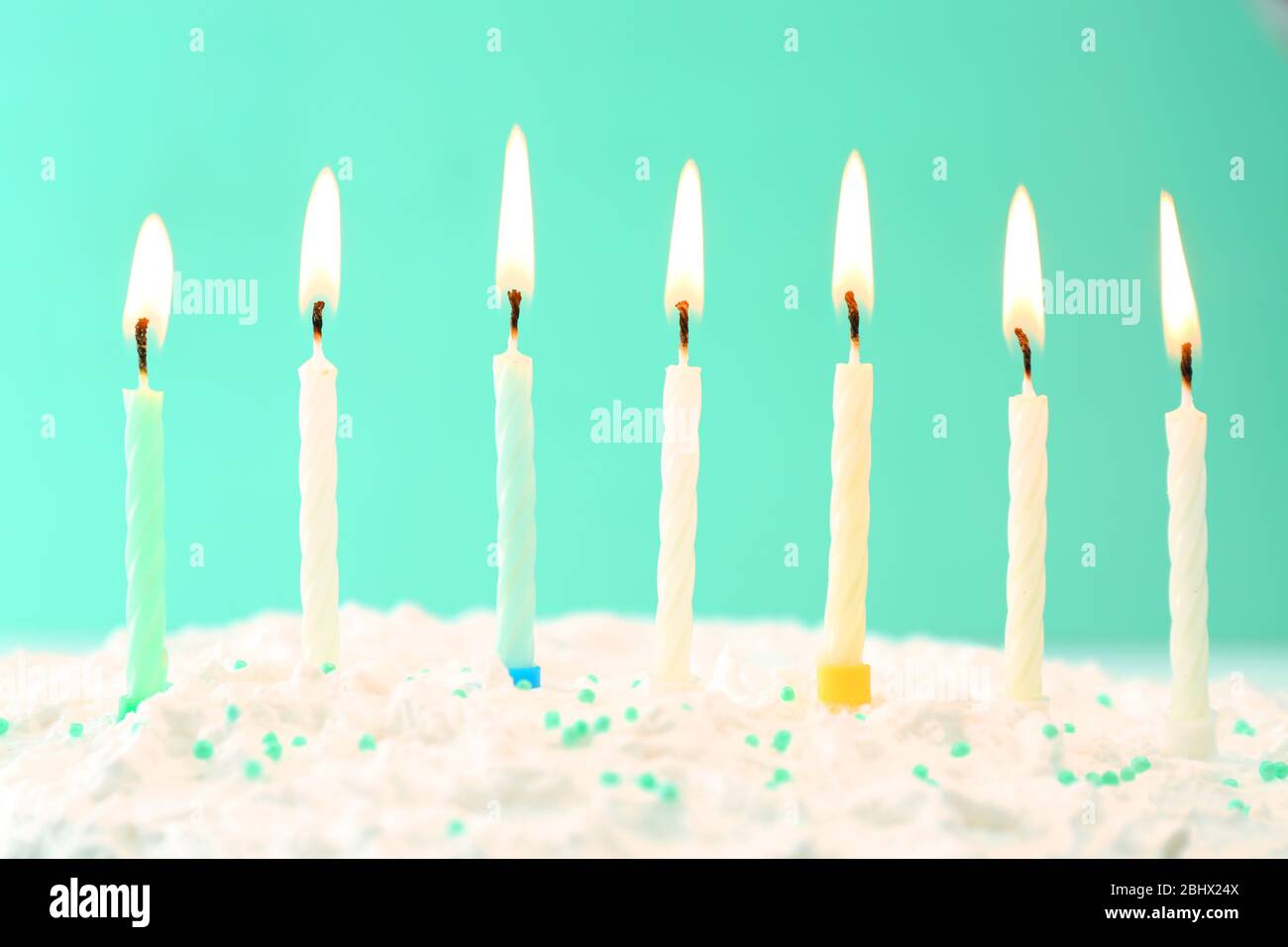 Birthday cake with candles on color background Stock Photo - Alamy