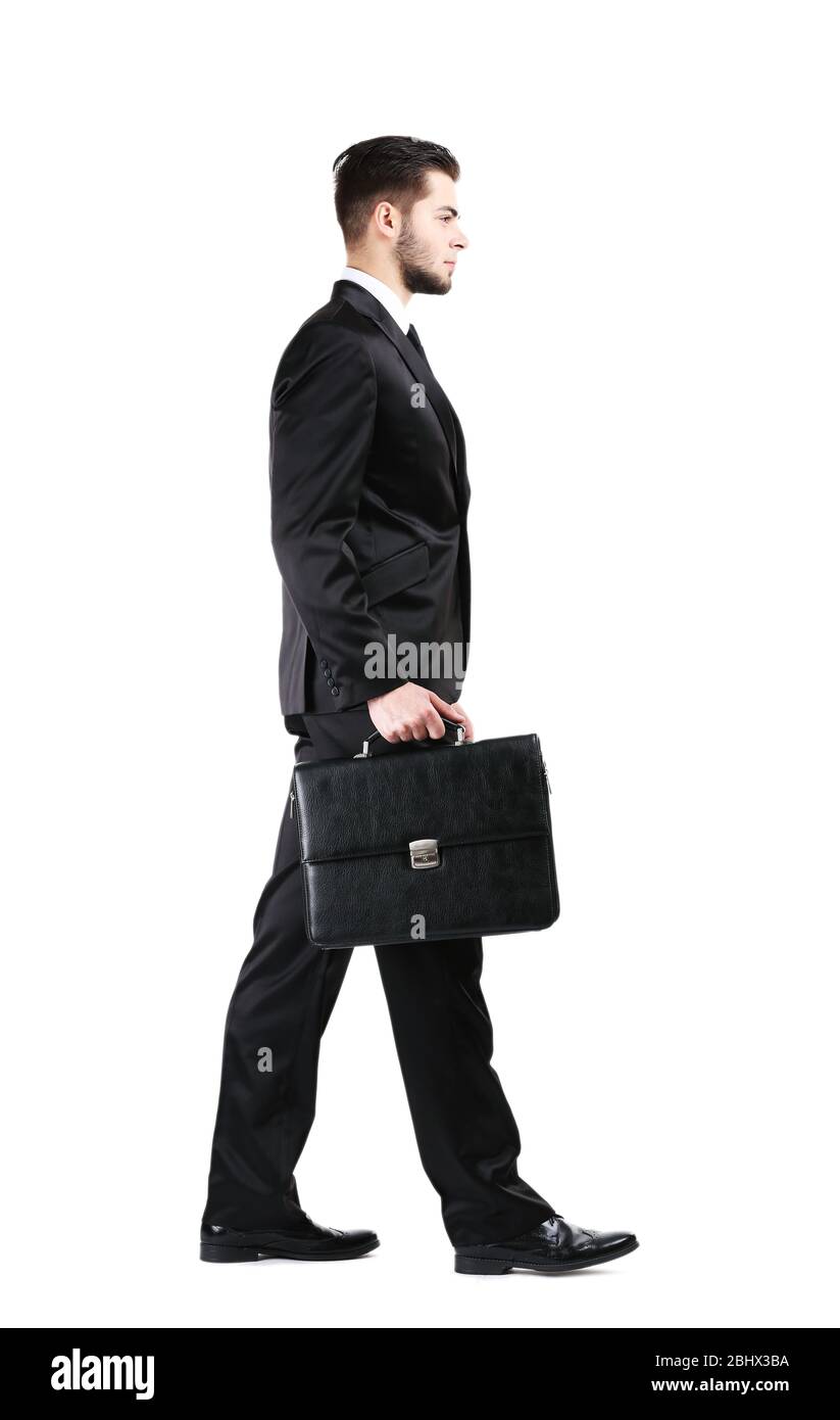 Elegant man in suit with briefcase isolated on white Stock Photo - Alamy