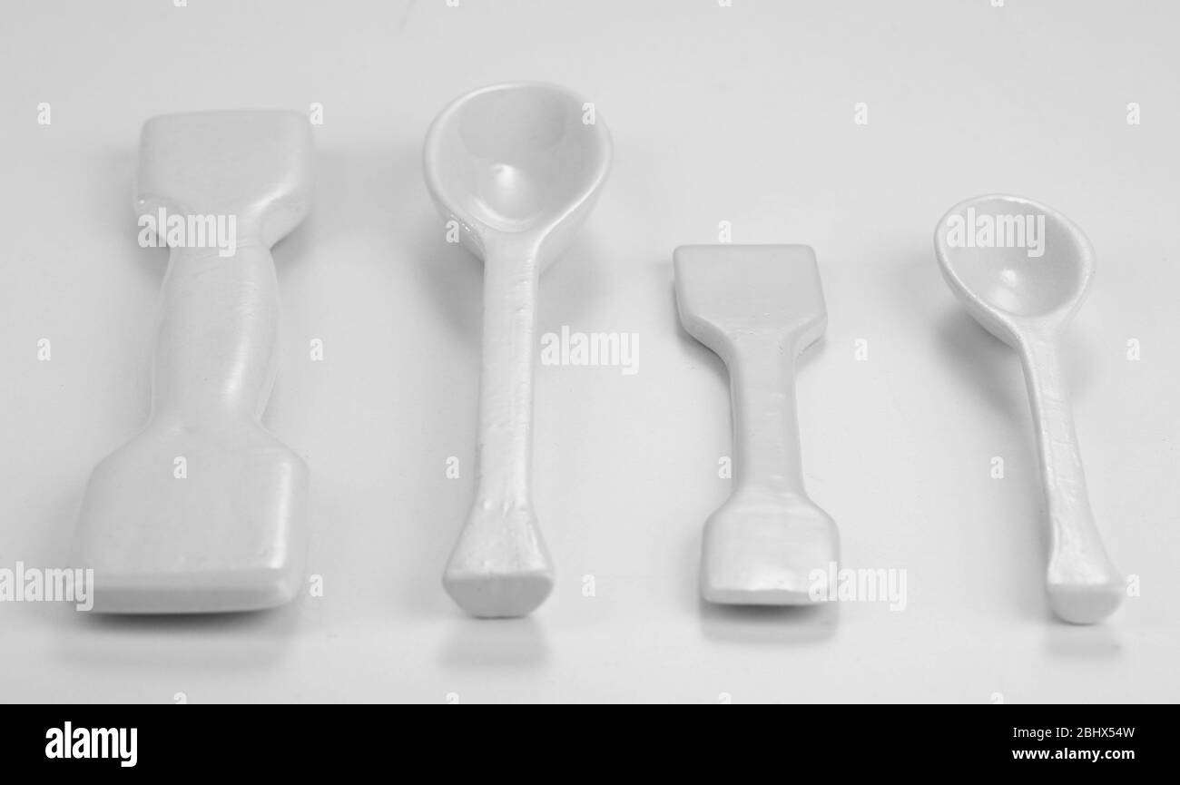 Laboratory spatulas isolated on white Stock Photo Alamy